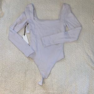 Brand new with tags, never worn, Aritzia long sleeved body suit